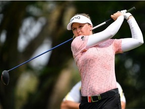 Brooke M. Henderson of Canada plays the shot during the first round of the Honda LPGA Thailand at the Siam Country Club Pattaya on February 21, 2019 in Chonburi, Thailand.