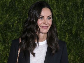 Courteney Cox attends the Through Her Lens: The Tribeca Chanel Women's Filmmaker Program Luncheon at Locanda Verde on Tuesday, Oct. 16, 2018, in New York.