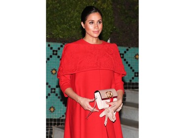 Meghan, the Duchess of Sussex, wears a red Valentino dress to meet Crown Prince Moulay Hassan at a Royal Residence in Rabat, Morocco, Feb. 24, 2019. (John Rainford/WENN.com)