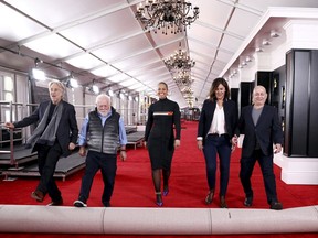 Neil Portnow, president of the Recording Academy, from left, executive producer Ken Erhlich, host Alicia Keys, producer Chantel Sausedo, and Jack Sussman, CBS Executive Vice President, Specials, Music, and Live Events, roll out the red carpet for the 61st annual Grammy Awards on Thursday, Feb. 7, 2019, in Los Angeles.