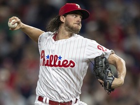 In this Sept. 29, 2018, file photo, Philadelphia Phillies starting pitcher Aaron Nola (27) throws against the Atlanta Braves in Philadelphia. (AP Photo/Laurence Kesterson, File)