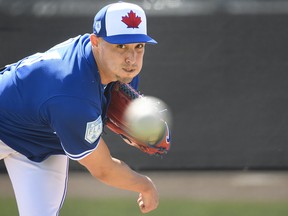 Toronto Blue Jays pitcher Aaron Sanchez (41) throws a bullpen session during spring training in Dunedin, Fla., on Friday, February 15, 2019. (THE CANADIAN PRESS/Nathan Denette)