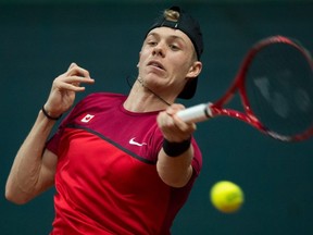 Canada's Denis Shapovalov plays a shot against Slovakia's Filip Horansky during their men's singles match in the Davis Cup 2019 tennis qualifier at the National Tennis Center in Bratislava, Slovakia on February 1, 2019.