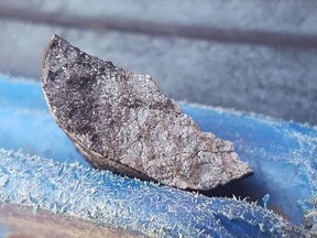 Handout picture released by Tele Pinar showing an alleged piece of a meteorite that fell in Cuba on February 1, 2019, taken in Vinalez, in the Cuban western province of Pinar del Rio. (Fatima RIVERO / TelePinar / AFP)