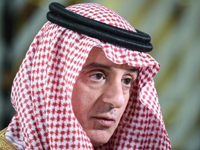 In this file photo taken on February 4, 2019, Saudi Arabia Foreign Minister Adel al-Jubeir  answers journalist during an European Union-Leagues Arab States ministerial meeting in Brussels. - Saudi Crown Prince Mohammed bin Salman was "not involved" in the murder of journalist Jamal Khashoggi, and blaming him would be crossing "a red line," Adel al-Jubeir said on February 8, 2019.