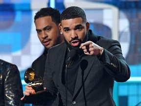 Rapper Drake accepts the award for Best Rap Son for "Gods Plan" during the 61st Annual Grammy Awards on February 10, 2019, in Los Angeles. (Photo by Robyn Beck / AFP)