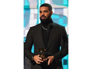 Canadian rapper Drake accepts the award for Best Rap Song for "Gods Plan" during the 61st Annual Grammy Awards on February 10, 2019, in Los Angeles.