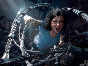 This image released by Twentieth Century Fox shows the character Alita, voiced by Rosa Salazar, in a scene from "Alita: Battle Angel."