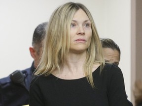This Feb. 14, 2013 file photo shows Amy Locane Bovenizer entering the courtroom to be sentenced in Somerville, N.J. for the 2010 drunk driving accident in Montgomery Township that killed 60-year-old Helene Seeman. (AP Photo/The Star-Ledger, Patti Sapone, File)