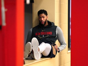 New Orleans Pelicans forward Anthony Davis waits to talk to reporters after practice in Metairie, La., Friday, Feb. 1, 2019. (AP Photo/Gerald Herbert)