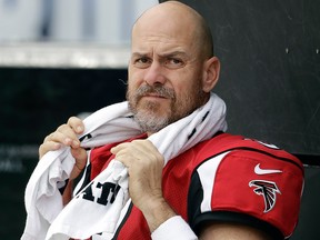 In this Dec. 11, 2016, file photo, Atlanta Falcons kicker Matt Bryant sits on the sidelines during the first half of an NFL game against the Los Angeles Rams in Los Angeles.