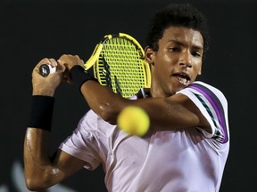 Felix Auger-Aliassime returns a shot to Jaume Munar during the ATP Rio Open at Jockey Club Brasileiro on February 22, 2019 in Rio de Janeiro, Brazil. (Buda Mendes/Getty Images)