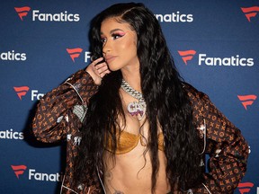 In this Saturday, Feb. 2, 2019 file photo, Cardi B arrives at the 2019 Fanatics Super Bowl Party in Atlanta.