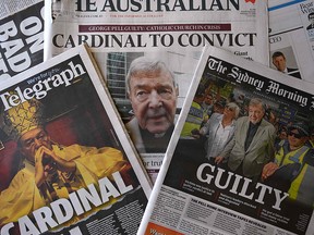 This photo illustration shows the front pages of Australia's major newspapers reporting the conviction of Cardinal George Pell in Sydney on February 27, 2019. (SAEED KHAN/AFP/Getty Images)
