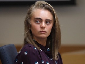 In this June 8, 2017 file photo, Michelle Carter sits in Taunton District Court in Taunton, Mass. Carter was convicted of involuntary manslaughter and sentenced to prison for encouraging 18-year-old Conrad Roy, III to kill himself in July 2014.