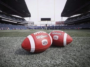 New CFL balls are photographed at the Winnipeg Blue Bombers stadium in Winnipeg May 24, 2018.
