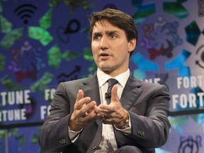 Prime Minister Justin Trudeau speaks at the Fortune Global Forum in Toronto on Monday, Oct. 15, 2018.