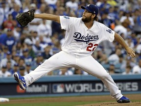 In this Oct. 28, 2018, file photo, Los Angeles Dodgers pitcher Clayton Kershaw winds up during Game 5 of the World Series against the Boston Red Sox in Los Angeles. (AP Photo/David J. Phillip, File)