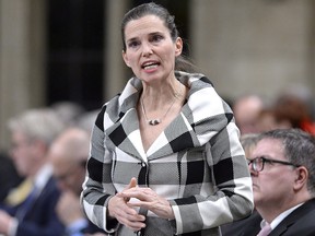 Minister of Science, Sport and Persons with Disabilities Kirsty Duncan rises during Question Period in the House of Commons on Parliament Hill in Ottawa on Thursday, March 1, 2018.