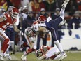 New England Patriots wide receiver Julian Edelman is tackled by Kansas City Chiefs linebacker Frank Zombo (51) during the AFC Championship game, Sunday, Jan. 20, 2019, in Kansas City, Mo.