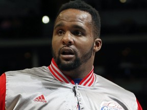 In this April 4, 2015, file photo, Los Angeles Clippers forward Glen Davis warms up before facing the Denver Nuggets in an NBA basketball game, in Denver.