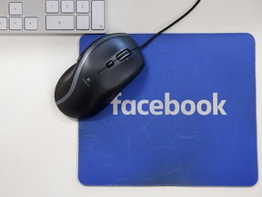 In this file photo taken on December 04, 2017, a mousepad with the Facebook logo is seen at Facebook's new headquarters at Rathbone Place in central London. (DANIEL LEAL-OLIVAS/AFP/Getty Images)
