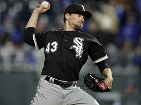 In this March 31, 2018, file photo, Chicago White Sox relief pitcher Danny Farquhar throws during a game against the Kansas City Royals at Kauffman Stadium. (AP Photo/Orlin Wagner)