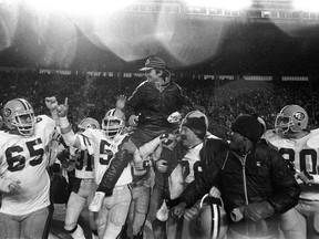 Edmonton Eskimos' coach Hugh Campbell is carried on the shoulders of players after the Eskimos won their fifth straight Grey Cup by defeating the Toronto Argonauts in Toronto on Nov. 28, 1982.