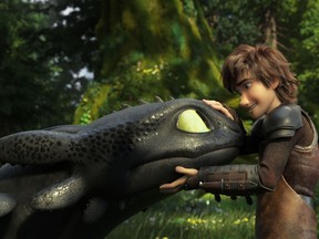This image released by Universal Pictures shows characters Toothless, left, and Hiccup, voiced by Jay Baruchel, in a scene from DreamWorks Animation's "How to Train Your Dragon: The Hidden World." (DreamWorks Animation/Universal Pictures via AP)
