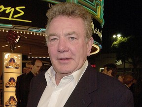 In this March 14, 2000, file photo, British actor Albert Finney arrives to the premiere of  "Erin Brockovich" in Los Angeles.