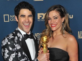 Darren Criss, left, winner of Best Performance by an Actor in a Limited Series or Motion Picture Made for Television, and Mia Swier attend the FOX, FX and Hulu 2019 Golden Globe Awards After Party at The Beverly Hilton Hotel on Jan. 6, 2019 in Beverly Hills, California.  (Jerod Harris/Getty Images)