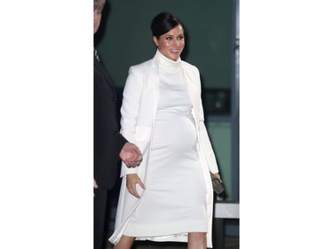 The Duchess of Sussex wears her winter whites to attend the gala performance of The Wider Earth at London's Natural History Museum, Feb. 12, 2019. She's wearing a Calvin Klein dress and an Amanda Wakeley coat. (John Rainford/WENN.com)
