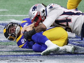 New England Patriots linebacker Dont’a Hightower sacks Los Angeles Rams quarterback Jared Goff in the first half of Super Bowl LIII at Mercedes-Benz Stadium last night in Atlanta. The Patriots won 13-3. (Getty Images)