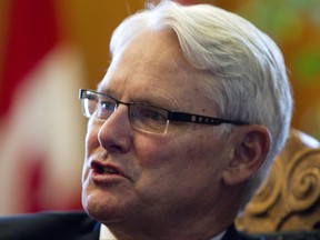 Then-B.C. Premier Gordon Campbell speaks during a interview in his office in Victoria on Feb. 14, 2011. (THE CANADIAN PRESS/Jonathan Hayward)