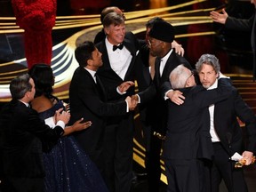 The cast and crew of 'Green Book' accept the Best Picture award during the 91st Annual Academy Awards at the Dolby Theatre in Los Angeles on Sunday, Feb. 24, 2019.