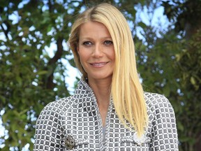 In this Jan. 26, 2016, file photo, Gwyneth Paltrow poses for photographers before Chanel's Spring-Summer 2016 Haute Couture fashion collection in Paris.