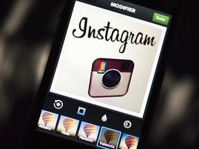 The Instagram logo is displayed on a smartphone on Dec.20, 2012 in Paris.