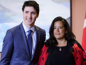 Prime Minister Justin Trudeau and Veterans Affairs Minister Jodie Wilson-Raybould attend a swearing in ceremony at Rideau Hall in Ottawa on Jan. 14, 2019.