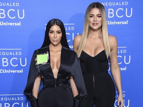 In this May 15, 2017, file photo, television personalities Kim Kardashian West, left, and Khloe Kardashian attend the NBCUniversal Network 2017 Upfront at Radio City Music Hall in New York.
