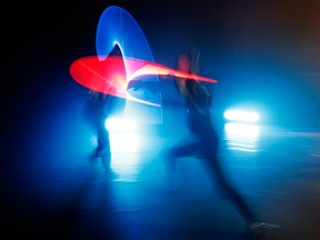 In this Sunday, Feb. 10, 2019, photo, competitors battle during a national lightsaber tournament in Beaumont-sur-Oise, north of Paris.