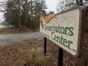 This Dec. 31, 2018 file photo shows a sign of Conservators' Center at the property near Burlington, N.C. (Woody Marshall/The Times-News via AP, File)