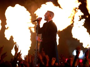 Adam Levine of Maroon 5 performs at the halftime show at Super Bowl LIII. GETTY IMAGES