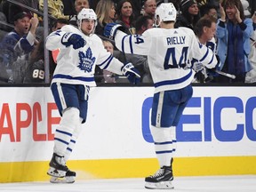 Auston Matthews and Morgan Rielly of the Toronto Maple Leafs celebrate after Rielly assisted on Matthews' second-period power-play goal against the Vegas Golden Knights during their game at T-Mobile Arena on February 14, 2019 in Las Vegas, Nevada. (Photo by Ethan Miller/Getty Images)