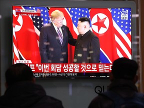 South Koreans watch a screen reporting on the U.S. President Trump meeting with North Korean leader Kim Jong-un at Seoul Railway Station on February 27, 2019 in Seoul, South Korea. (Chung Sung-Jun/Getty Images)