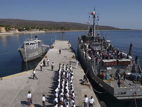 In this May 12, 2005 file photo, inmates line up on the pier after arriving at the Islas Marias federal prison island, located 90 miles south of Mazatlan, Mexico.