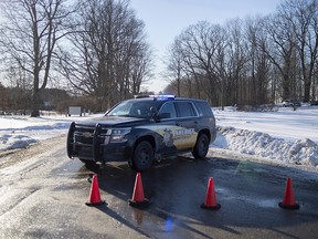 Kent County Sheriff personnel investigate the scene of a fatal shooting on Monday, Feb. 18, 2019, near Cedar Springs, Mich. (Neil Blake/MLive.com/The Grand Rapids Press via AP)