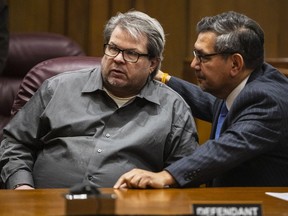 In this Monday, Jan. 7, 2019, file photo, Jason Dalton, left, talks with his defense attorney Eusebio Solis moments before pleading guilty to six counts of murder and several other charges at the Kalamazoo County Courthouse in Kalamazoo, Mich.