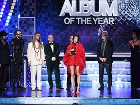 (L-R) Craig Alvin, Shawn Everett, Ian Fitchuk, Daniel Tashian, Steve Fallone, Kacey Musgraves, and Greg Calbi accept the Album Of The Year award for 'Golden Hour' during the 61st Annual GRrammy Awards at Staples Center on Feb. 10, 2019 in Los Angeles.