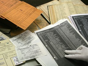 A handout file photo taken on May 5, 2009 by the International Tracing Service (ITS) in Bad Arolsen, central Germany, shows Nazi documents, each time the original and its exact copy. (VERENA NEUSUES/AFP/Getty Images)