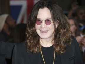 In this Sept. 28, 2015 file photo, Ozzy Osbourne poses for photographers upon arrival at the Pride of Britain Awards 2015 in London.  ocker Ozzy Osbourne is in a hospital. Sharon Osbourne wrote on Twitter Wednesday, Feb. 6, 2019,  the 70-year-old was admitted "following some complications from the flu." She wrote doctors believe "this is the best way to get him of a quicker road to recovery."